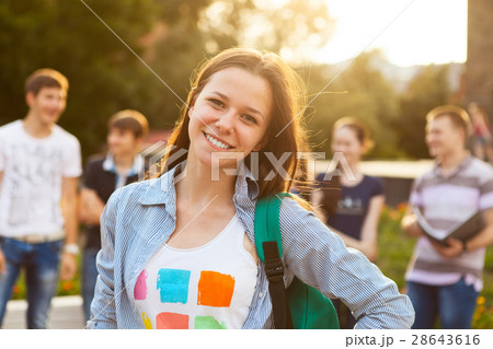 Female smiling student outdoors Female smiling student outdoors 28643616