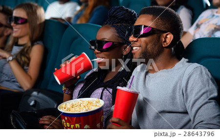 Young African couple at the cinema Young African couple at the cinema 28643796