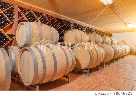Wine Barrels and Bottles Age Inside Cellar 28646229