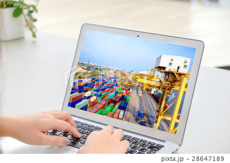 Hands woman working online of logistics on laptop 28647189