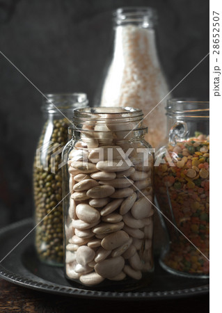 Lentils, white beans, rice in glass bottles Lentils, white beans, rice in glass bottles 28652507