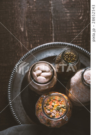 Beans, lentils, rice, bottled on a tin plate 28652543