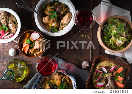 Pilaf, Salad and drink on festive table 28652811