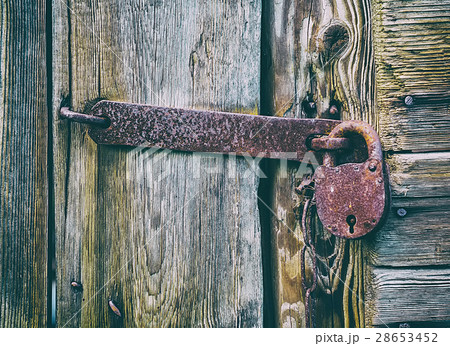 old metallic padlock old metallic padlock 28653452