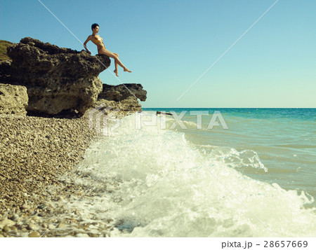 Beautiful woman on beach 28657669