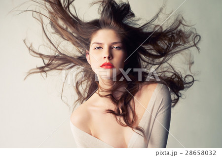 Beautiful woman with magnificent hair Beautiful woman with magnificent hair 28658032