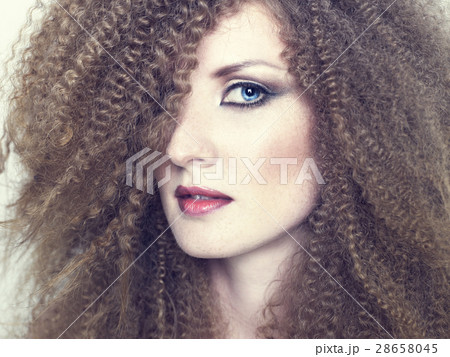 Beautiful woman with magnificent hair 28658045