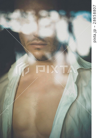 Portrait of man through the window 28658807