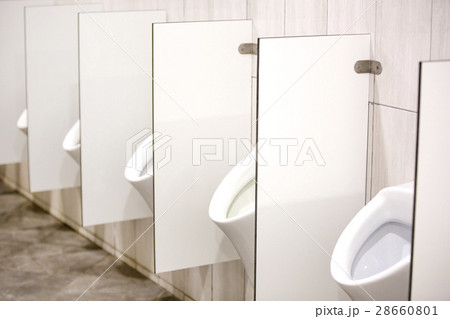 Several white urinals in men's room  28660801