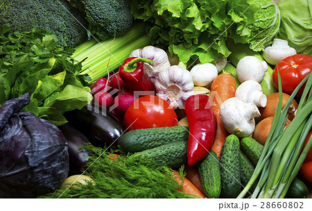 Background of fresh vegetables and greens closeup Background of fresh vegetables and greens closeup 28660802