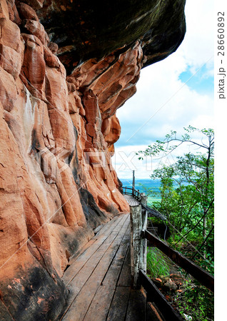 Wooden walkway around sandstone the mountain. 28660892