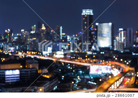 Abstract blurred bokeh lights city and highway Abstract blurred bokeh lights city and highway 28661007