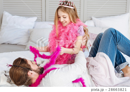 Happy family playing on the bed Happy family playing on the bed 28663821