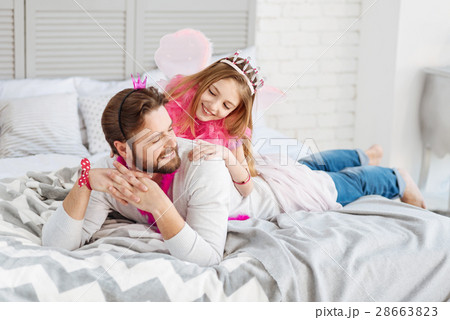 Relaxed man lying on the bed 28663823