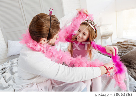 Happy father and daughter embracing each other Happy father and daughter embracing each other 28663863
