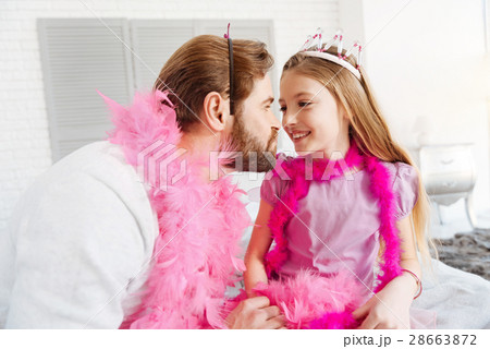 Portrait of funny daddy playing with his daughter 28663872