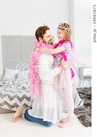 Delighted man standing on his knees 28663873