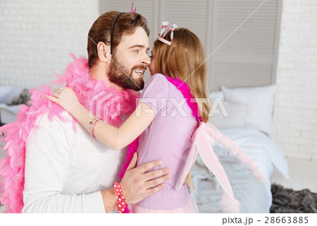 Brunette man hugging his daughter Brunette man hugging his daughter 28663885