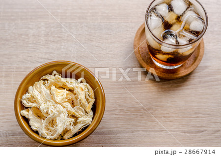 close up in dried squid and cola in glass close up in dried squid and cola in glass 28667914