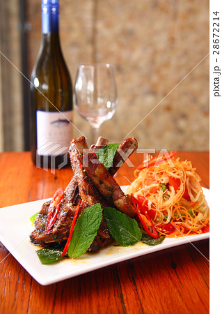 Grill lamb with papaya salad Grill lamb with papaya salad 28672214