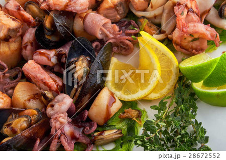 shrimp and Octopus on a white plate shrimp and Octopus on a white plate 28672552