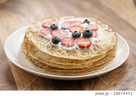fresh blinis or crepes with fresh berries and fresh blinis or crepes with fresh berries and 28674451