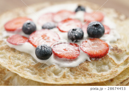 fresh blinis or crepes with fresh berries and fresh blinis or crepes with fresh berries and 28674453