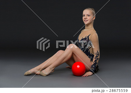 Gymnastist girl with red ball Gymnastist girl with red ball 28675559