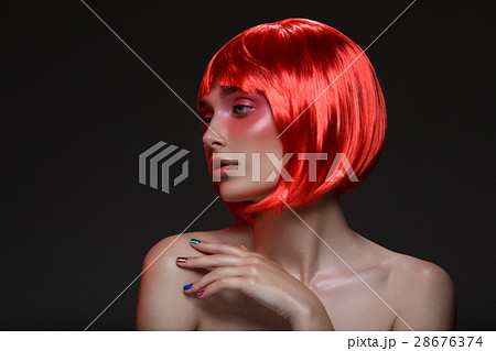 Beautiful girl in red wig Beautiful girl in red wig 28676374
