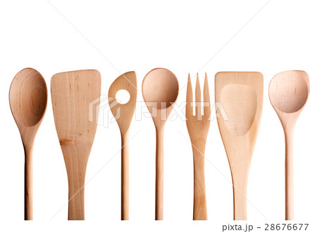Wooden spoon, spatula, fork on a white background. 28676677
