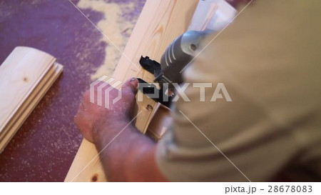 man sawing boards electric jigsaw man sawing boards electric jigsaw 28678083
