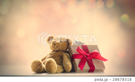 cute teddy bear and beautiful gift on the fairy lights bokeh bac 28678318