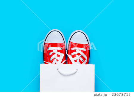 big red gumshoes in cool shopping bag big red gumshoes in cool shopping bag 28678715
