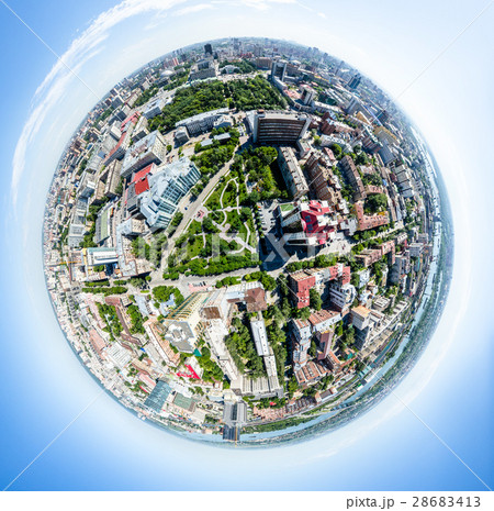 Aerial city view with roads, houses and buildings. Aerial city view with roads, houses and buildings. 28683413