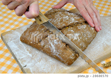Cutting Rustic Bread 28686570