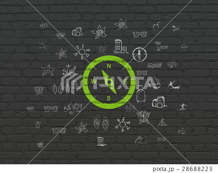 Tourism concept: Compass on wall background 28688223