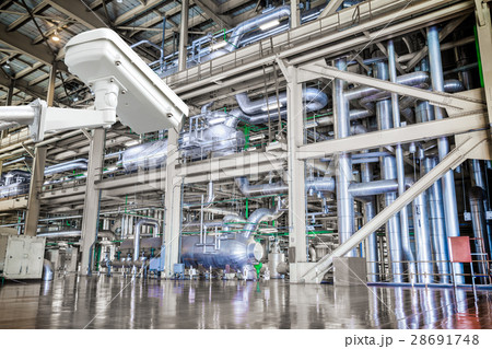 CCTV camera operating inside industrial factory 28691748