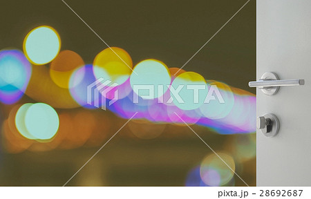 opened door to abstract background with bokeh 28692687