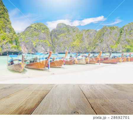 wooden platform with long tail boat on beach wooden platform with long tail boat on beach 28692701