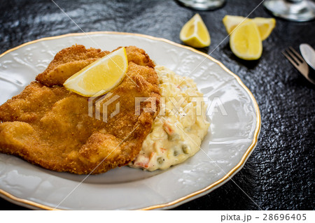 Schnitzel with salad Schnitzel with salad 28696405