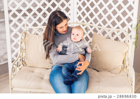 Mother and her child. Mom playing with laughing 28696830