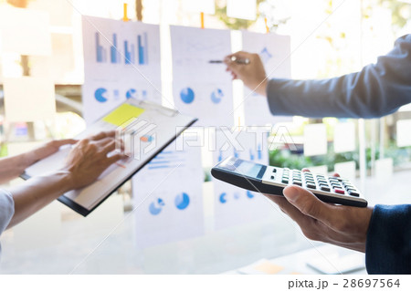business man financial inspector and secretary making report, ca business man financial inspector and secretary making report, ca 28697564