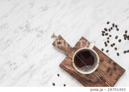 Cup of coffee on a marble surface with copy-space 28701403