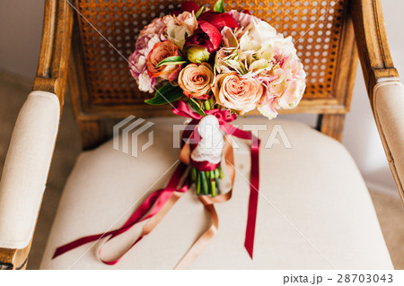 Beautiful wedding bouquet of marsala flowers Beautiful wedding bouquet of marsala flowers 28703043