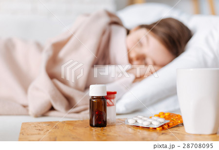 Medicines lying on the table 28708095