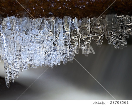 Winter creek  with icicles above freeze  stream 28708561