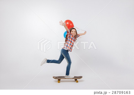 Talented little child skateboarding in the studio Talented little child skateboarding in the studio 28709163