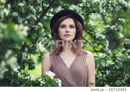 Pretty Woman on Floral Background. Spring Beauty Pretty Woman on Floral Background. Spring Beauty 28710365
