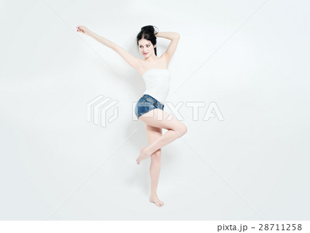 Young Beauty. Joyful Woman on Background Young Beauty. Joyful Woman on Background 28711258