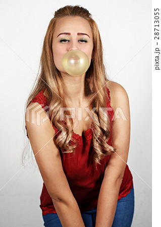 Woman making a big bubble 28713055